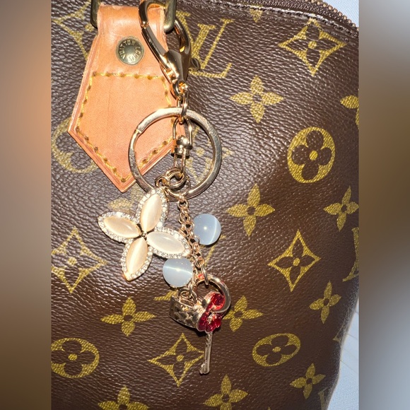Gold-tone keychain bag charm floral design and lock and key accents - Picture 5 of 5